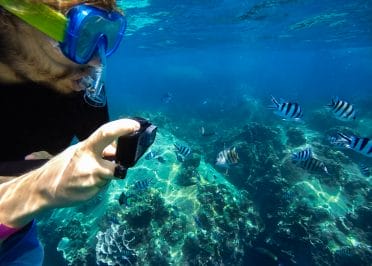 Swimming with Gopro beach vacation packing list
